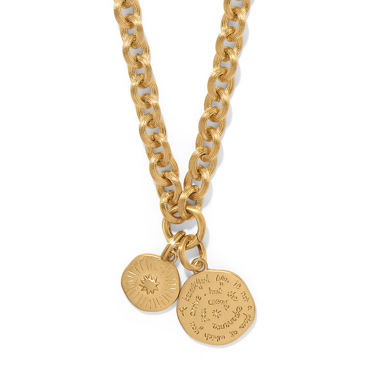 Gold plated adjustable necklace with a Token pendant featuring the message 'A beautiful life is not a place at which you arrive'.