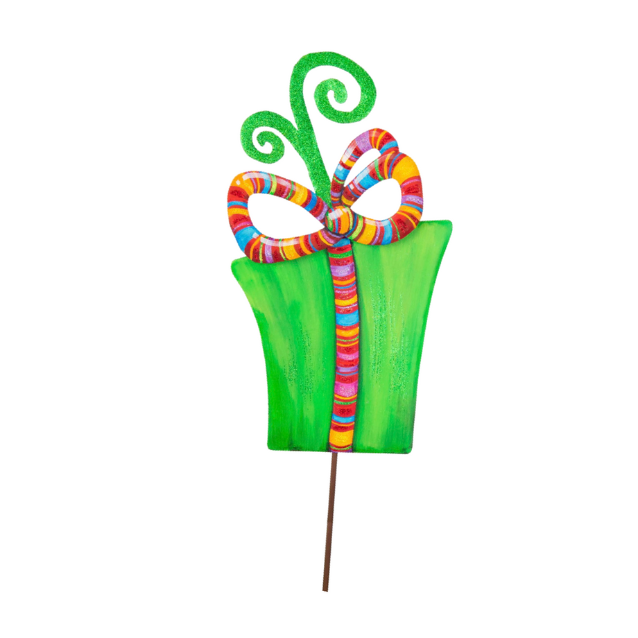 Green gift box yard stake with a colorful striped bow and glittery green swirls.