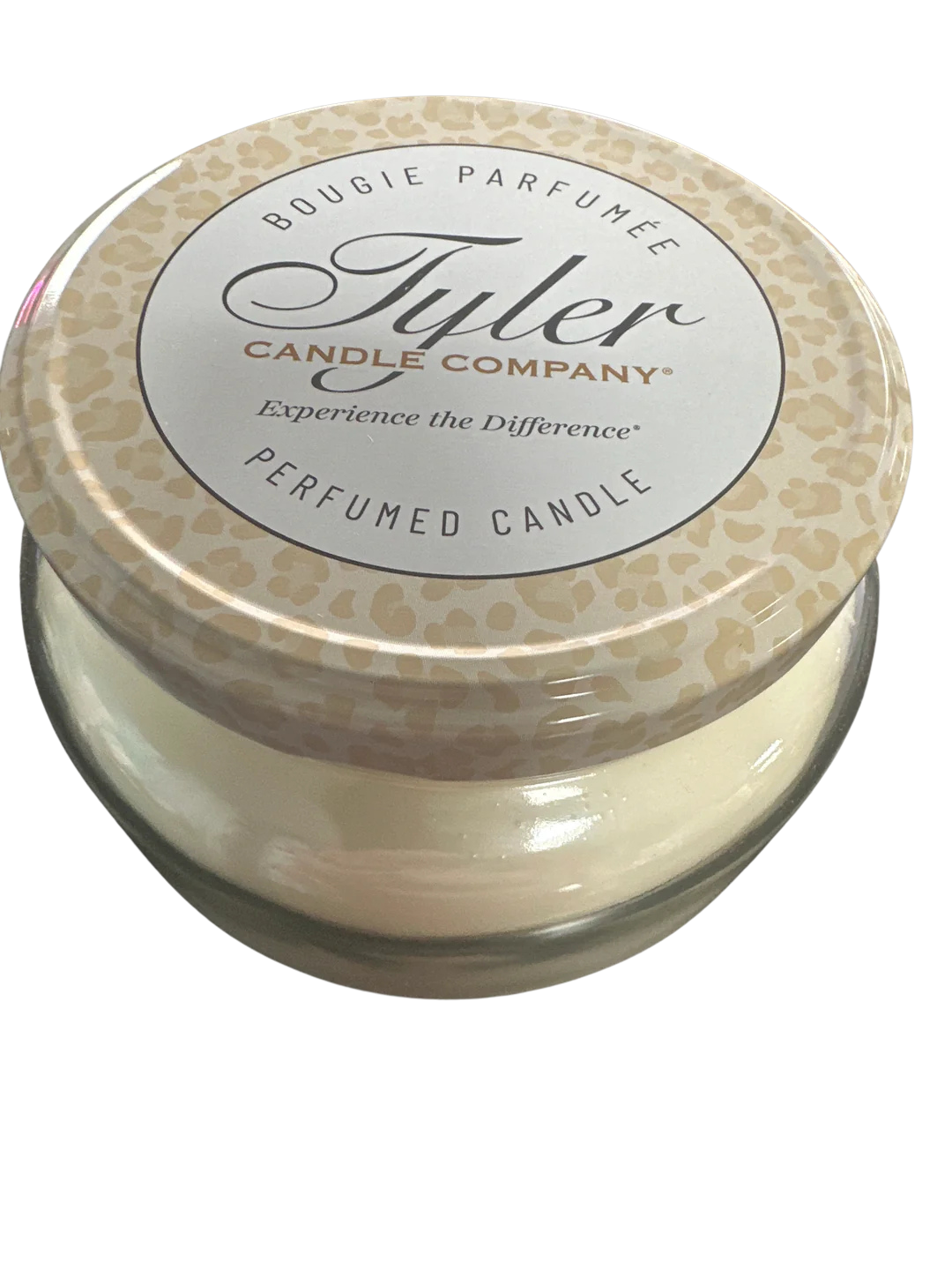 11oz Tyler Candle in a glass jar with a leopard print lid and two wicks.