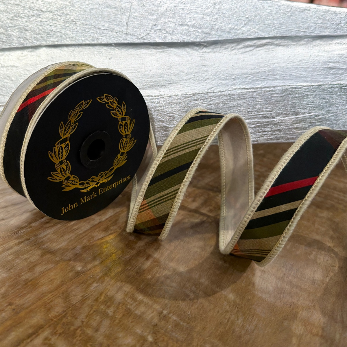 1x10yd Huntington Plaid Tafetta Fused Ribbon on a spool with a gold laurel wreath logo.