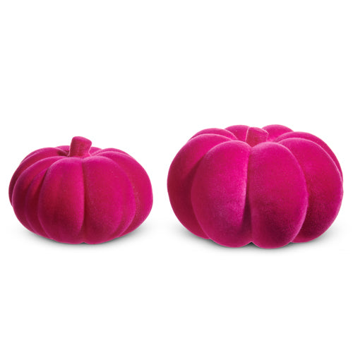 Two bright pink flocked foam pumpkins in different sizes on a white background.