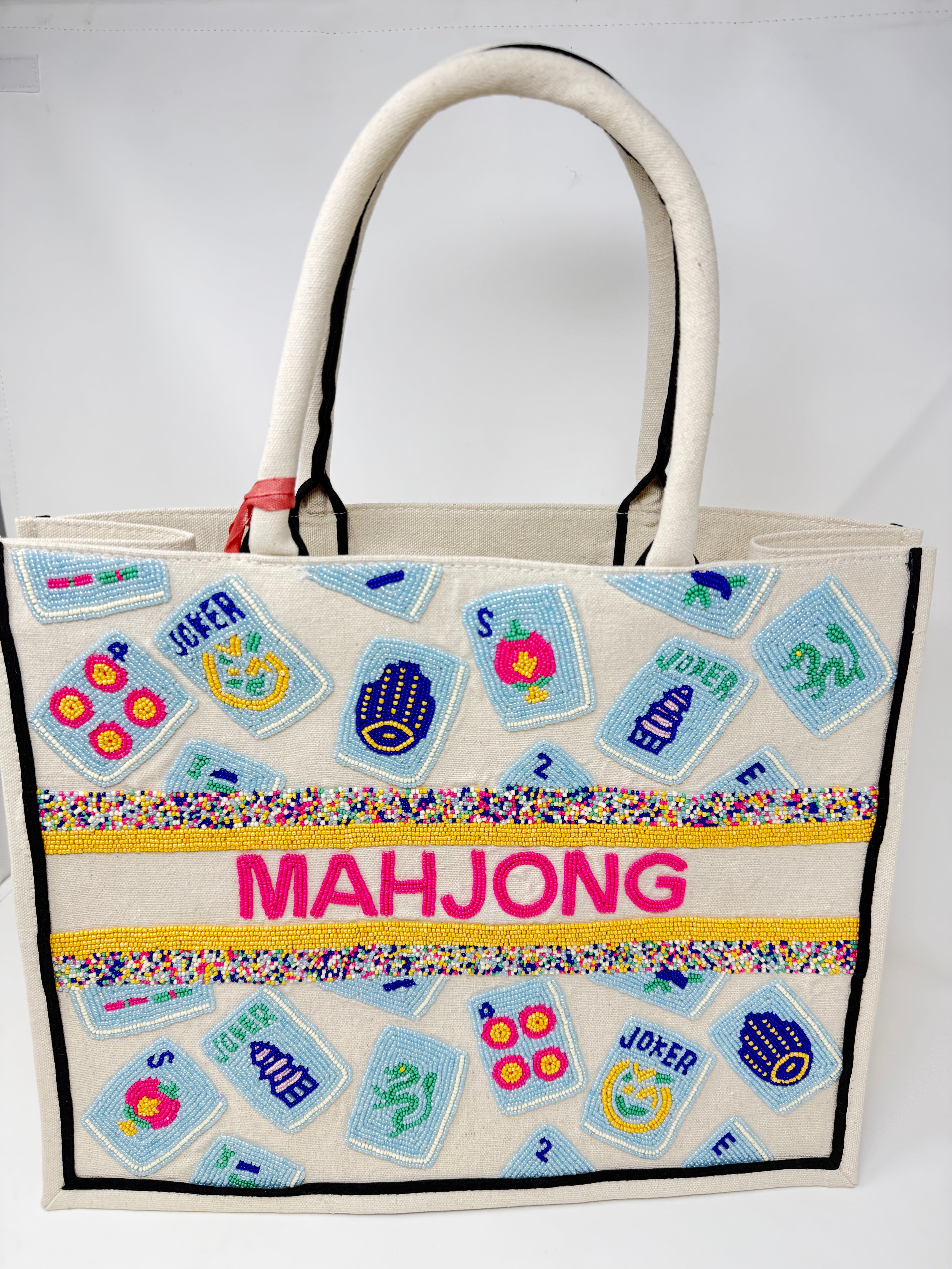 Hand-beaded canvas tote bag featuring blue mahjong tiles and pink beaded "MAHJONG" text.