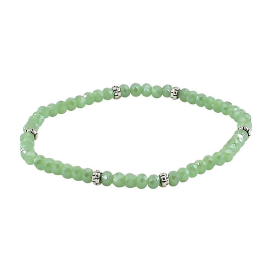 Silver crystal mini bracelet with a small accent stone on an elastic band.