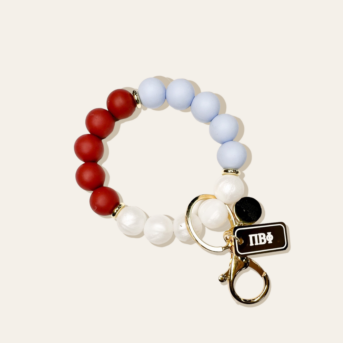 Black sorority hands-free wristlet with a detachable keychain strap