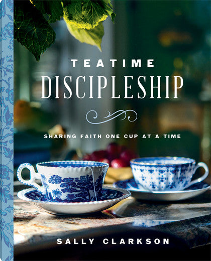 Teatime Discipleship book cover featuring a woman in a cozy home setting with tea and Scripture.