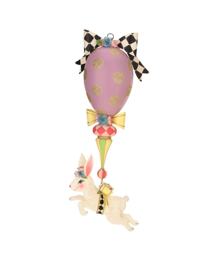 Hanging rabbit finial with a natural wood finish featuring intricate carved ears and tail.