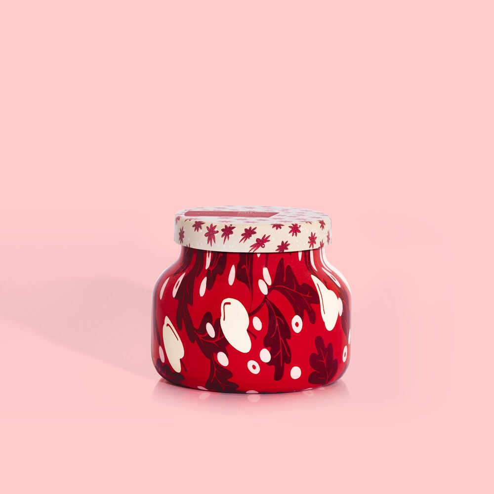Petite glass jar candle in apple cider social holiday pattern with up to 40-hour burn time.