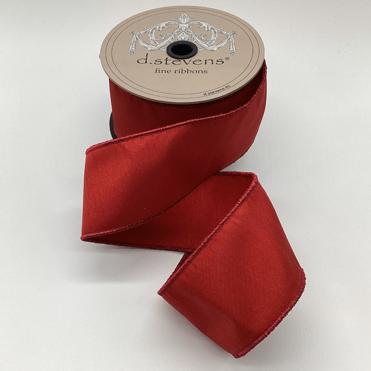 2.5-inch wide crimson red faux dream dupion ribbon on a spool.