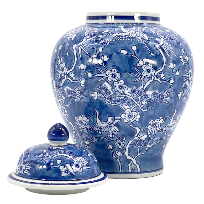 Blue and white ceramic ginger jar with floral crane chinoiserie pattern