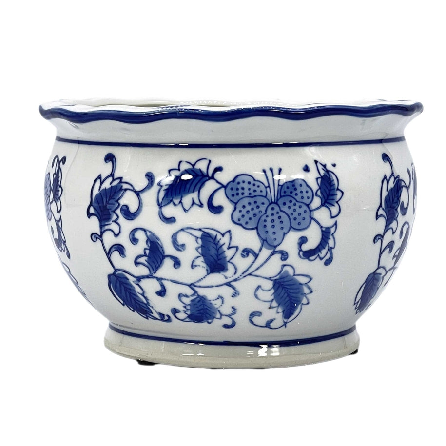 Blue and white floral ceramic pot with ruffled lip