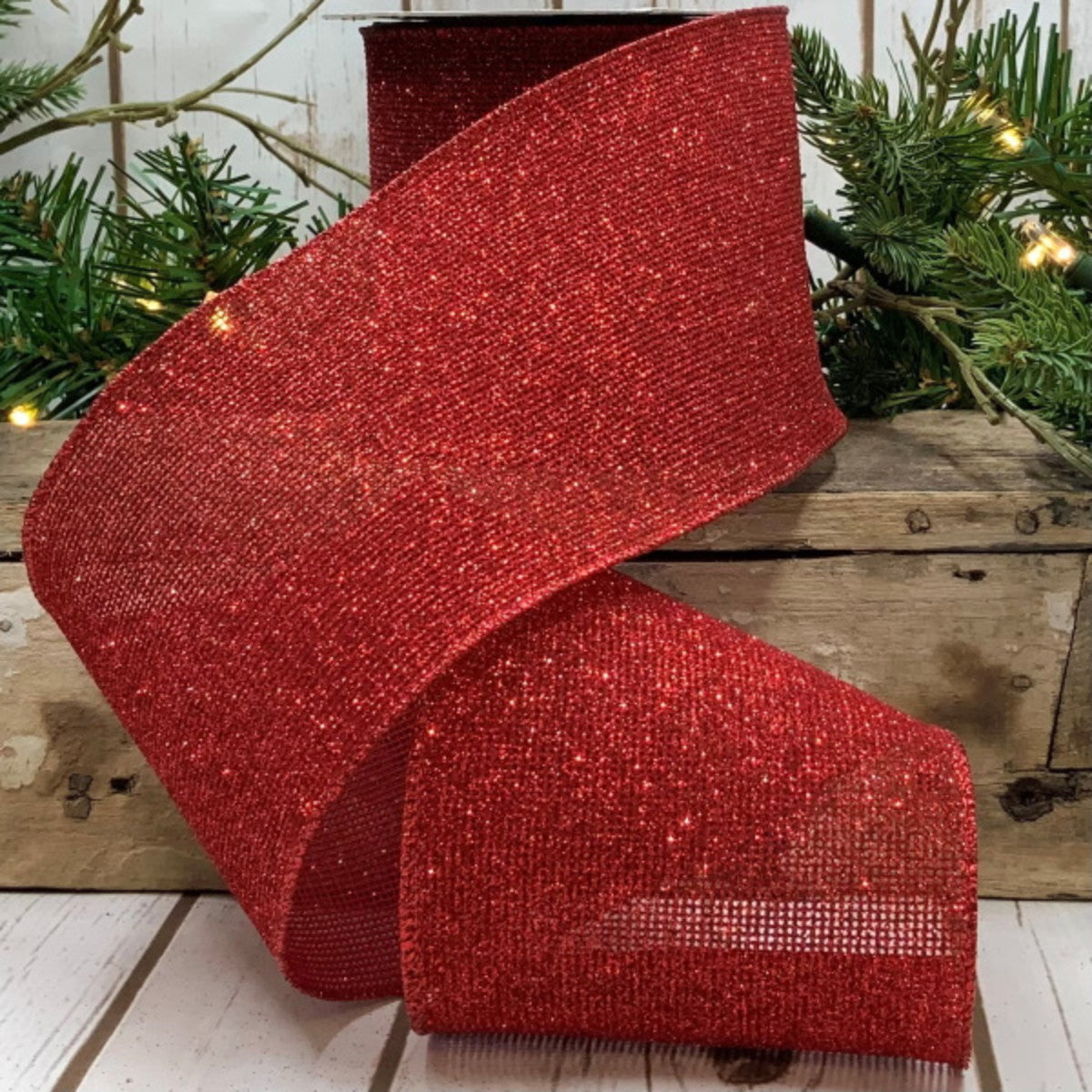 Red glitter mesh mini square fabric measuring four inches by ten yards.