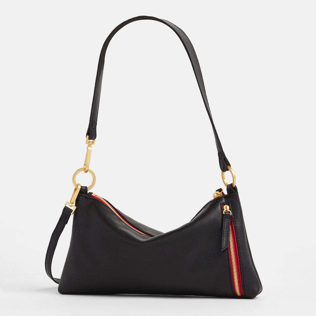 Black brushed gold Kyle bag with red zipper accent featuring detachable straps.