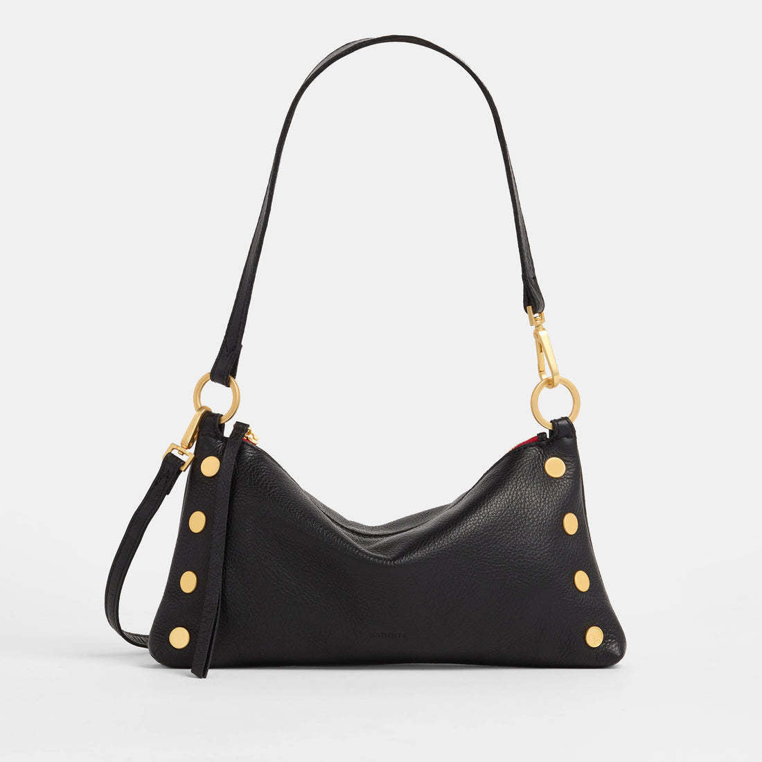 Black brushed gold Kyle bag with red zipper detail shown from front.