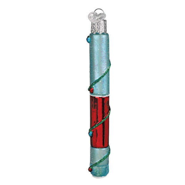 Red festive injection pen-shaped ornament with 'Ho Ho Ho' text.