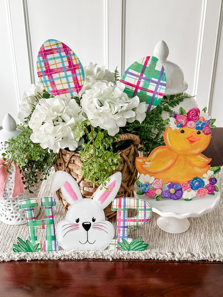 Plaid Eggs stake with a red and black checkered fabric pattern.