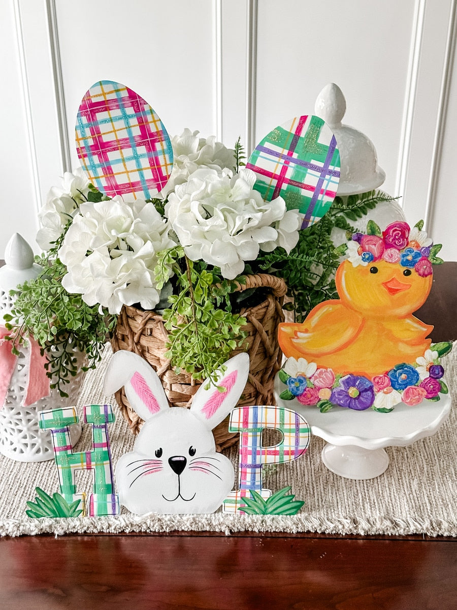 Plaid Eggs stake with a red and black checkered fabric pattern.