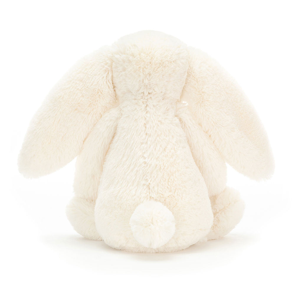 Back view of a Bashful Cream Bunny plush toy with long floppy ears and a small round tail.