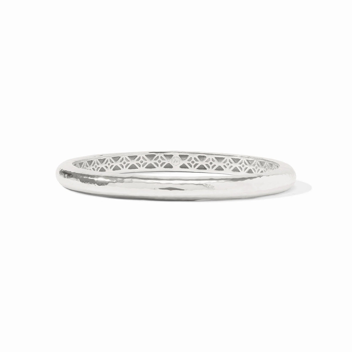 Havana bangle in gold-tone metal with a lightly hand-hammered finish and ornate geometric piercework interior.