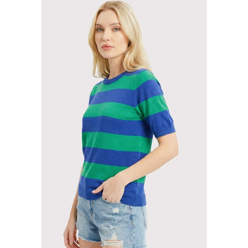 Woman wearing the Ruby Short Sleeves Striped Sweater in blue and green with denim shorts.