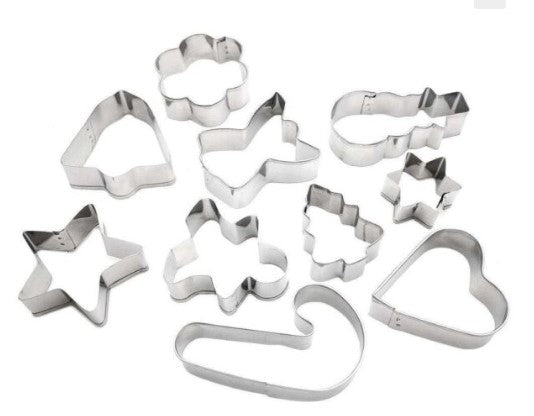 Ten stainless steel Christmas cookie cutters in shapes like a star, heart, tree, and candy cane.