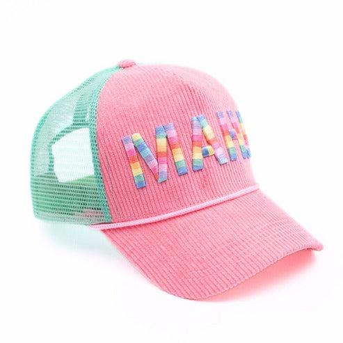 Pink corduroy trucker hat with green mesh back and rainbow 'MAHJ' 3D embroidery on the front.