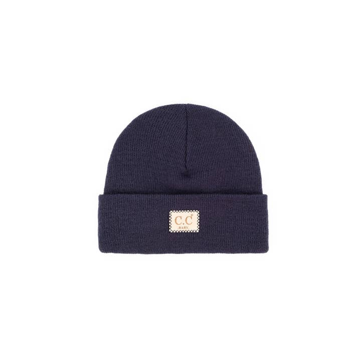 Baby ribbed beanie in classic neutral tone made from soft acrylic knit fabric.