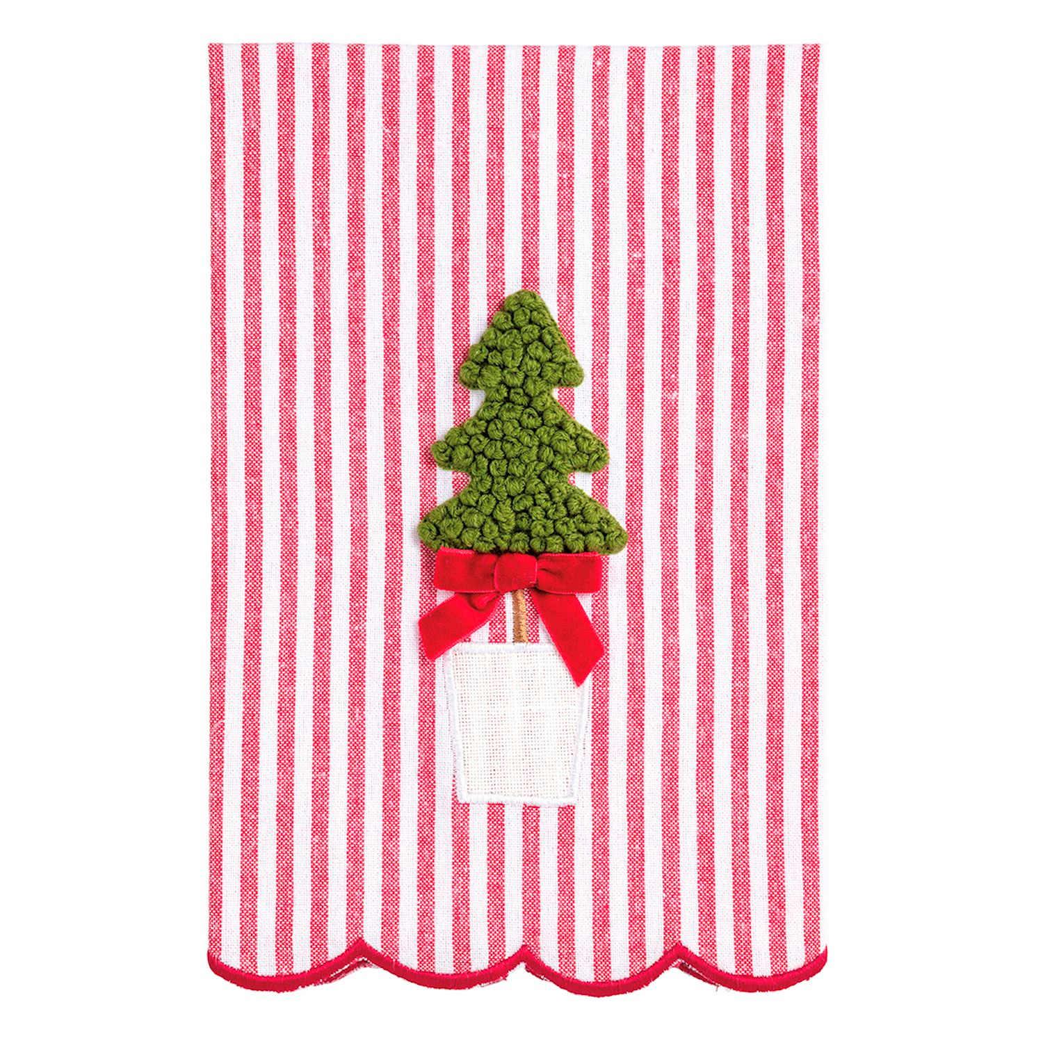 Red and white striped tea towel with a green textured Christmas tree topiary and red velvet bow.