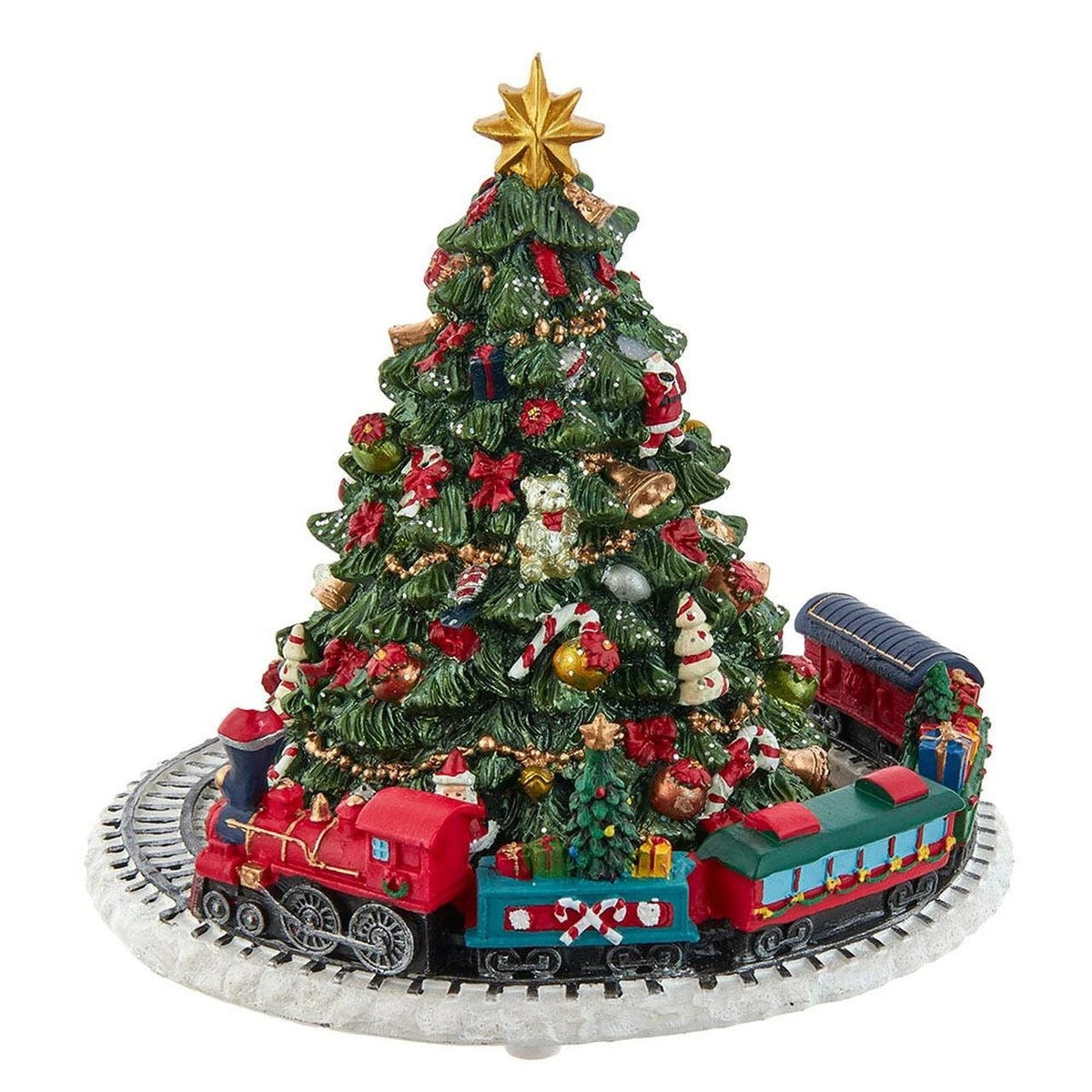 Christmas tree music box with a revolving red and green train on a snowy track base.