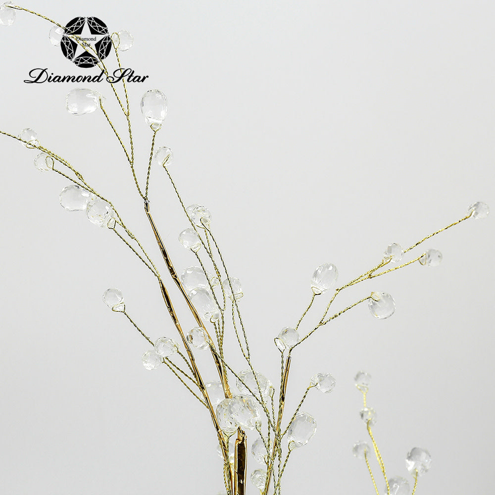 Decorative tree with shimmering branches, crystal accents, gold base