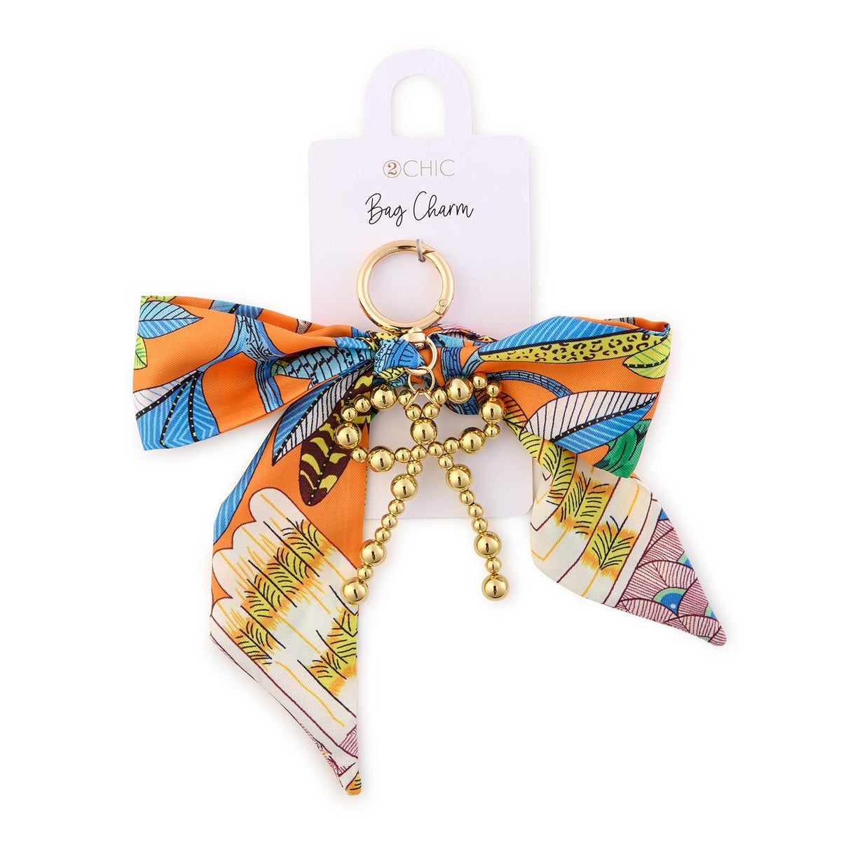 Polyester scarf bag charm with metal bow tie detail in neutral tones