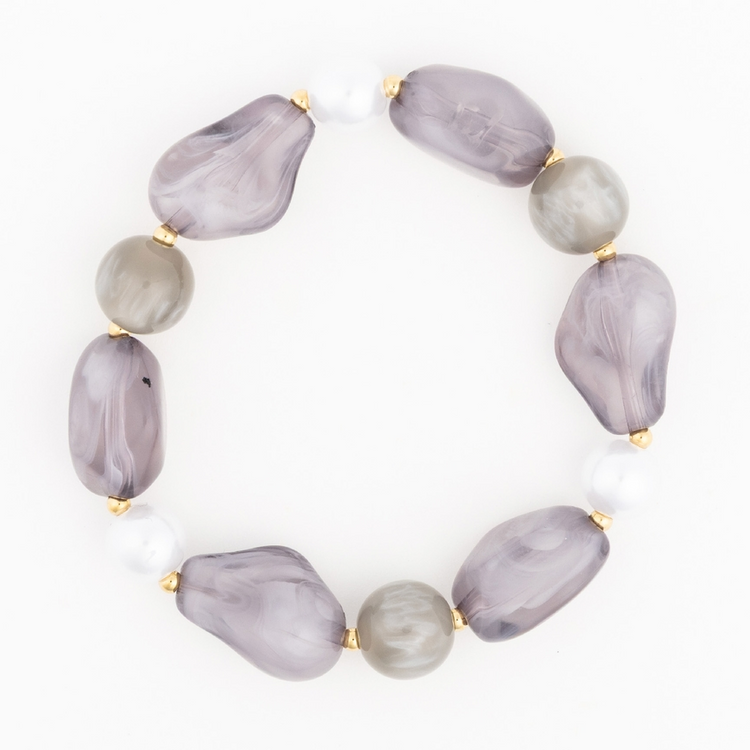 Zoe Bracelet featuring marbled grey, smooth taupe, and white beads with gold-tone spacers.