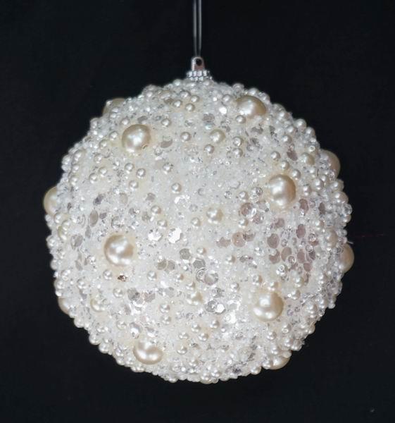 4.5-inch white styrofoam ball ornament covered in clear ice crystals and various sized pearls.