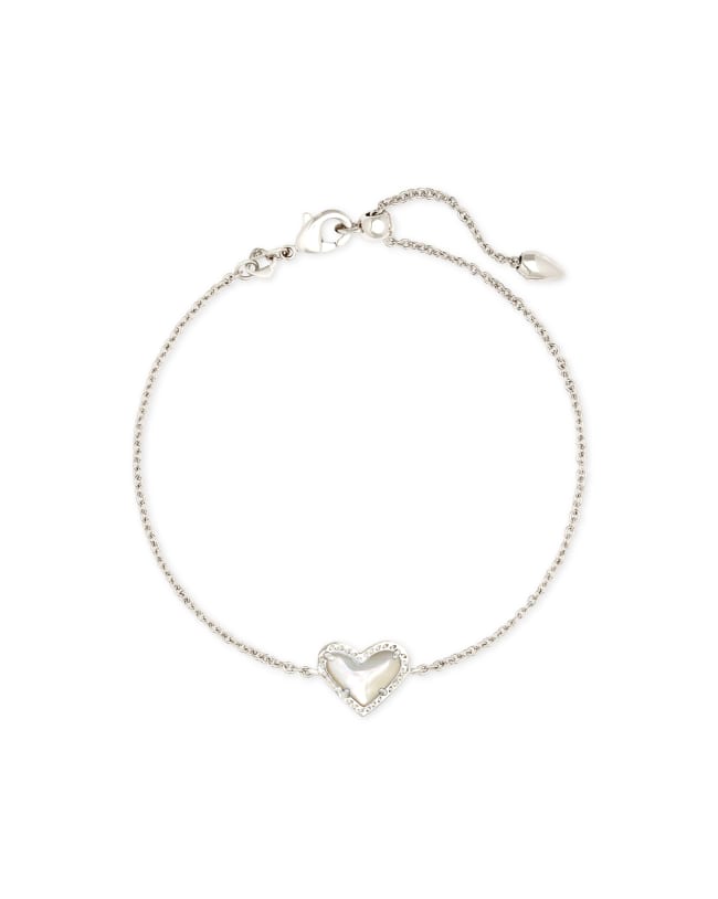 Ari Heart Delicate Chain Bracelet in Ivory Mother-of-Pearl with an adjustable lobster claw closure.