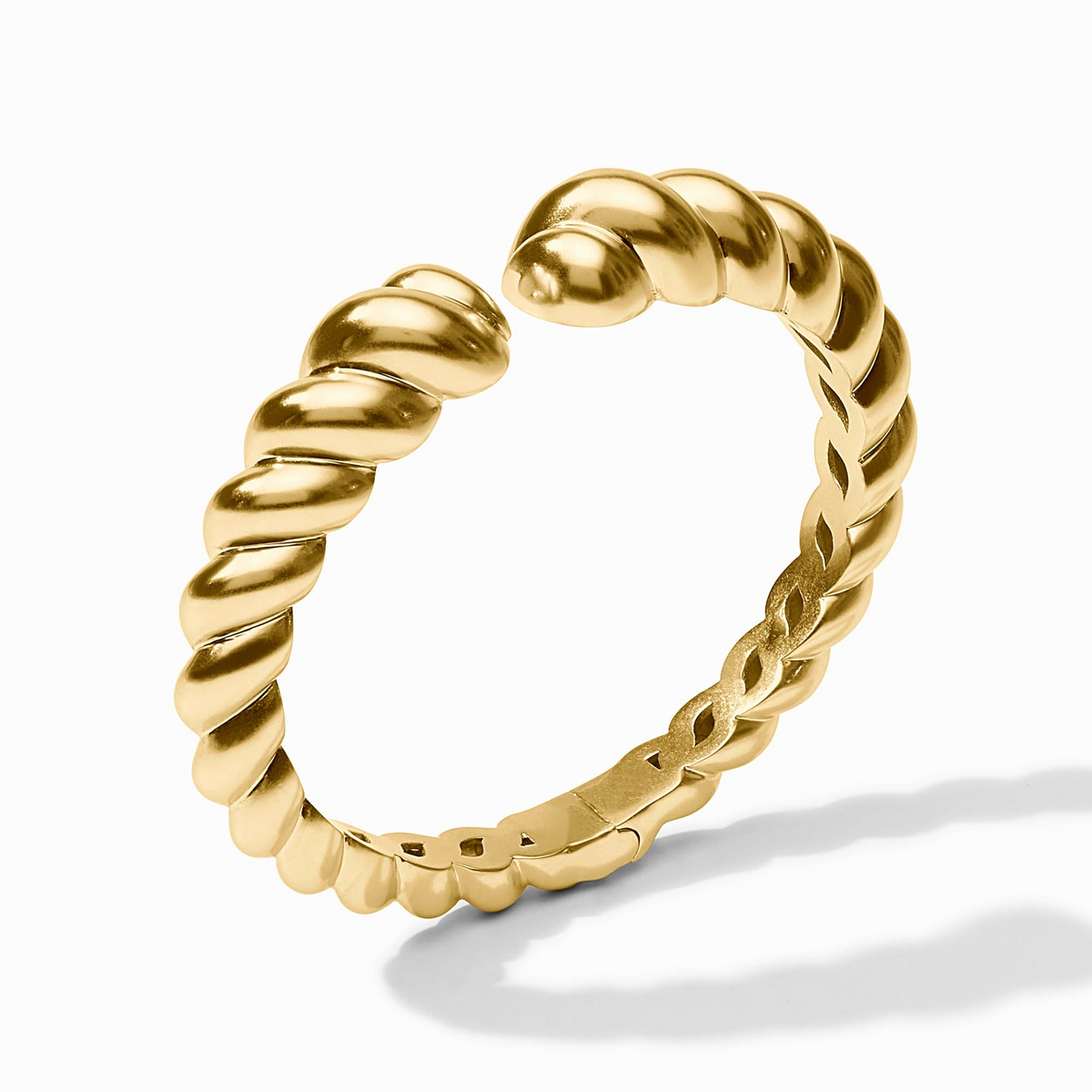 Gold-plated Ravello Cuff bracelet with a twisted rope design and spring hinge closure.