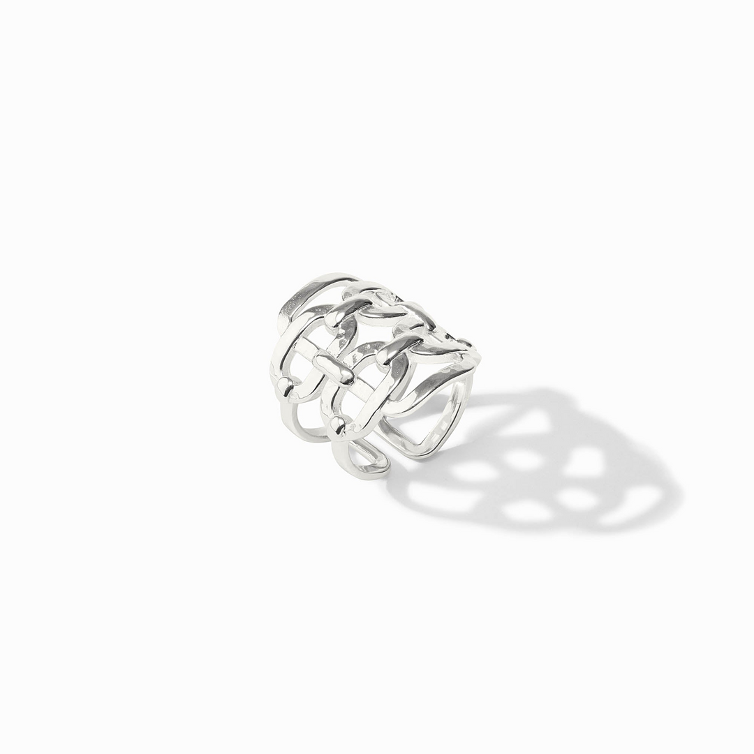 Sahara Statement Ring in silver featuring an intricate, wide-band woven chain design.