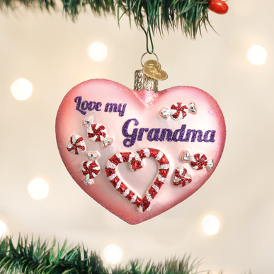 Grandma Heart Ornament in red resin with a white heart cutout silhouette.