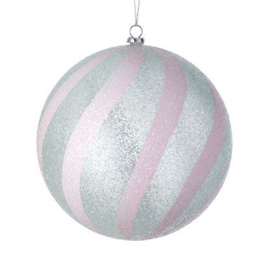 Round white ornament with colorful candy cane swirls on a silver background
