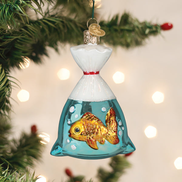 Goldfish In A Bag Ornament featuring a swimming goldfish inside a clear bag with Christmas lights.