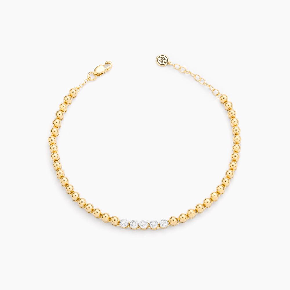 Gold Aza Chain Bracelet featuring a row of small gold beads and five central diamonds.