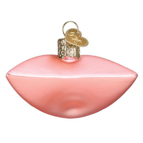Pink glass mouth ornament with braces, featuring a gold heart charm and hanging loop.