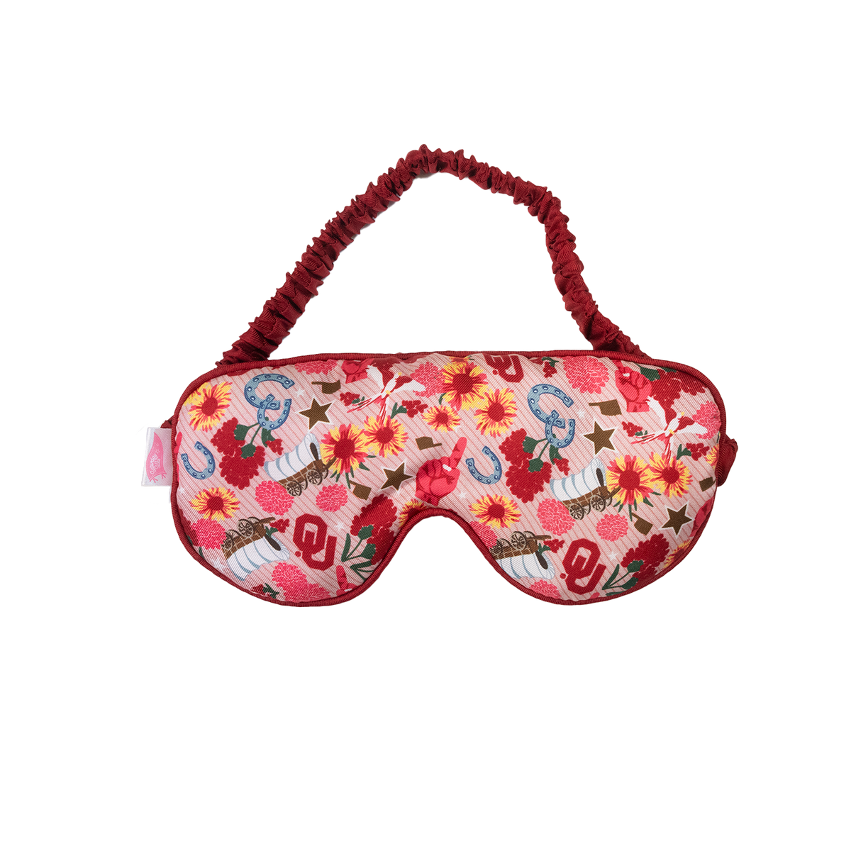Silk twill sleepmask with a red floral and Oklahoma Sooners themed pattern and elastic strap.