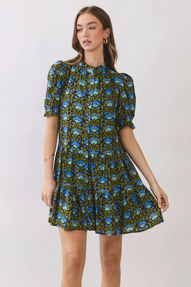 Penelope floral print mini dress with puff sleeves, ruffle neckline, and tiered skirt.