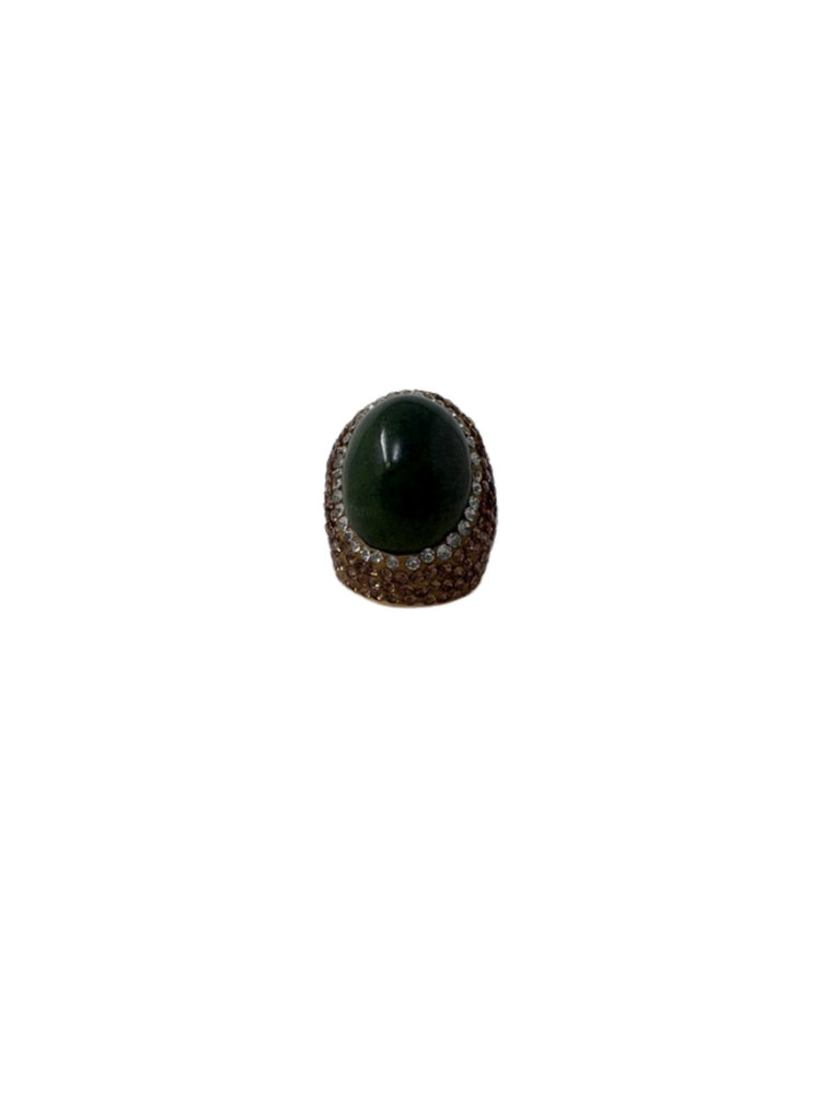 Queen of Sheba Fashion Ring featuring a large oval dark green stone surrounded by crystals.
