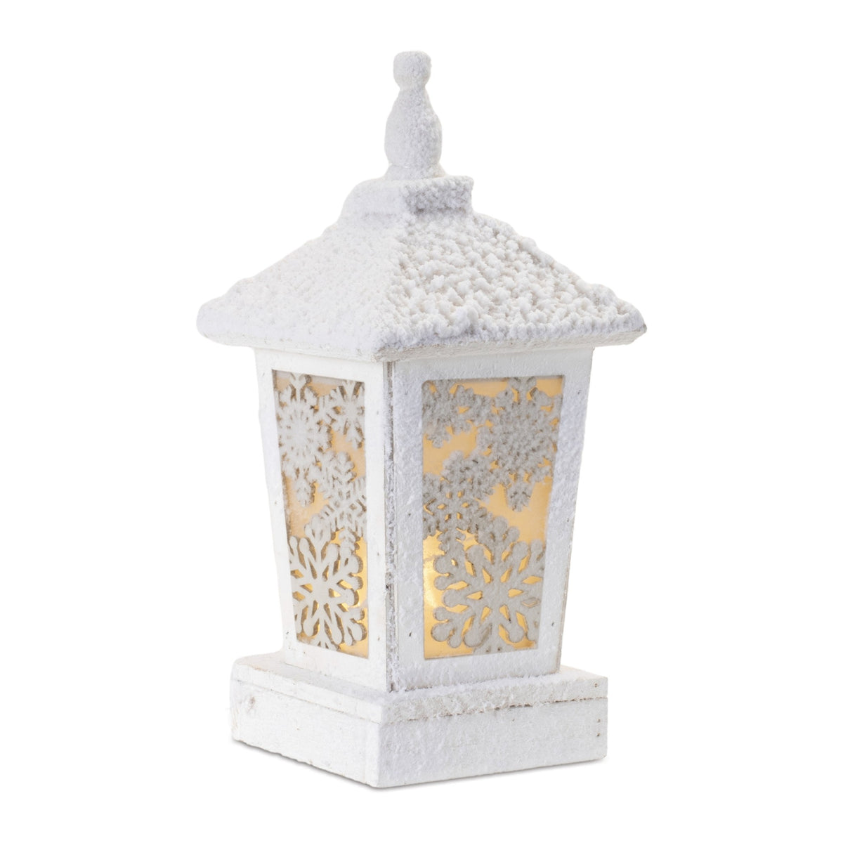 Wooden lantern with snowy finish featuring intricate snowflake cutouts