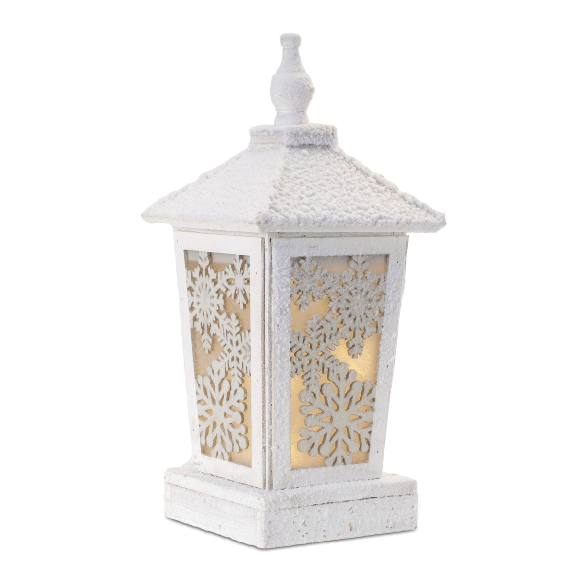 Wooden lantern with snowflake cutouts in snowy finish