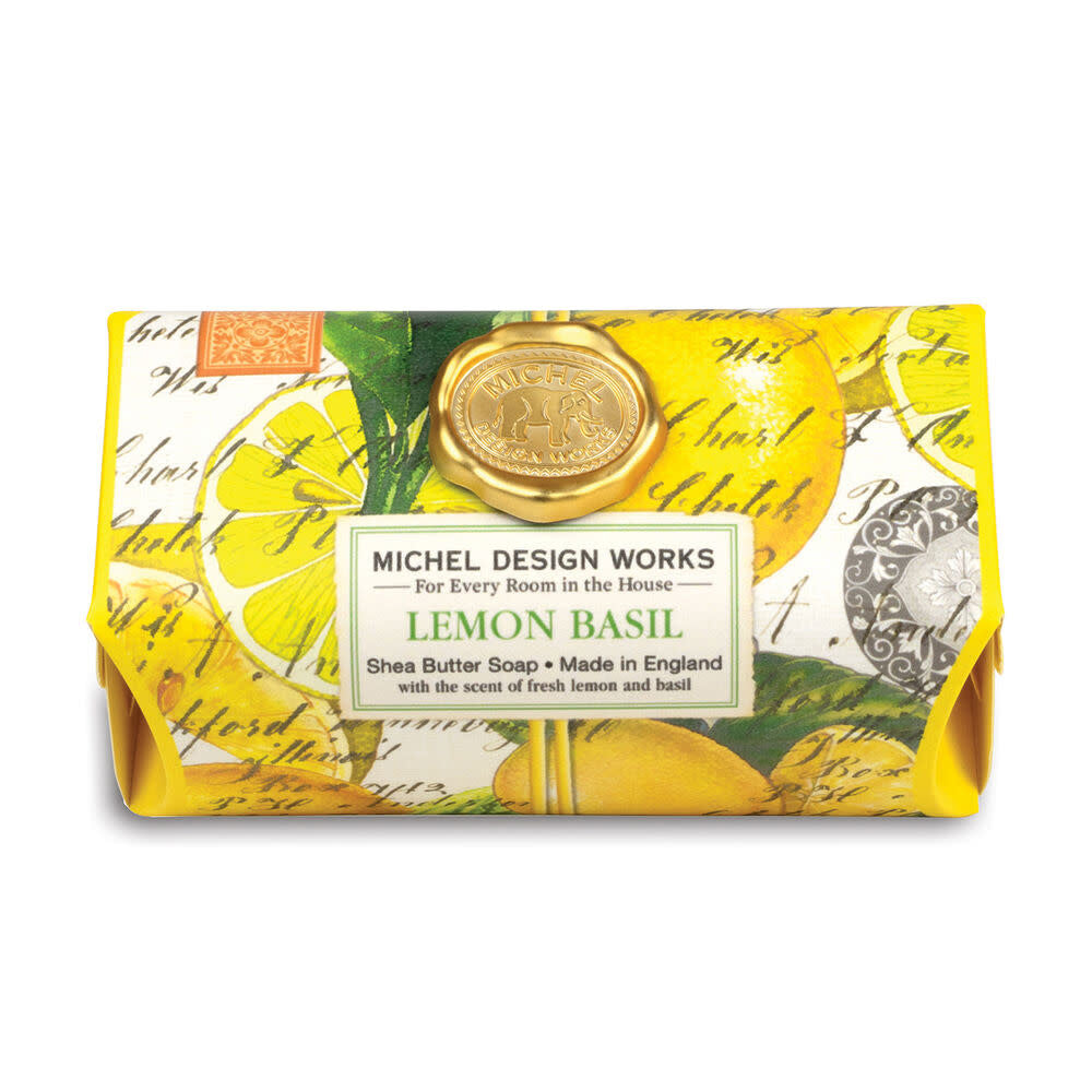 Large rectangular bath soap bar in pale yellow with green speckles