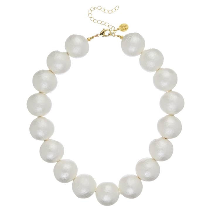 Large cotton pearl choker necklace with a simple circular silhouette.
