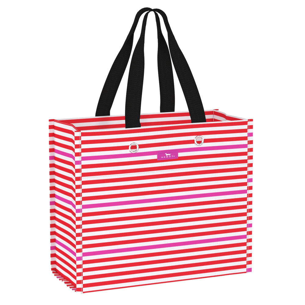 Large woven gift bag with grommets for ribbon attachment.