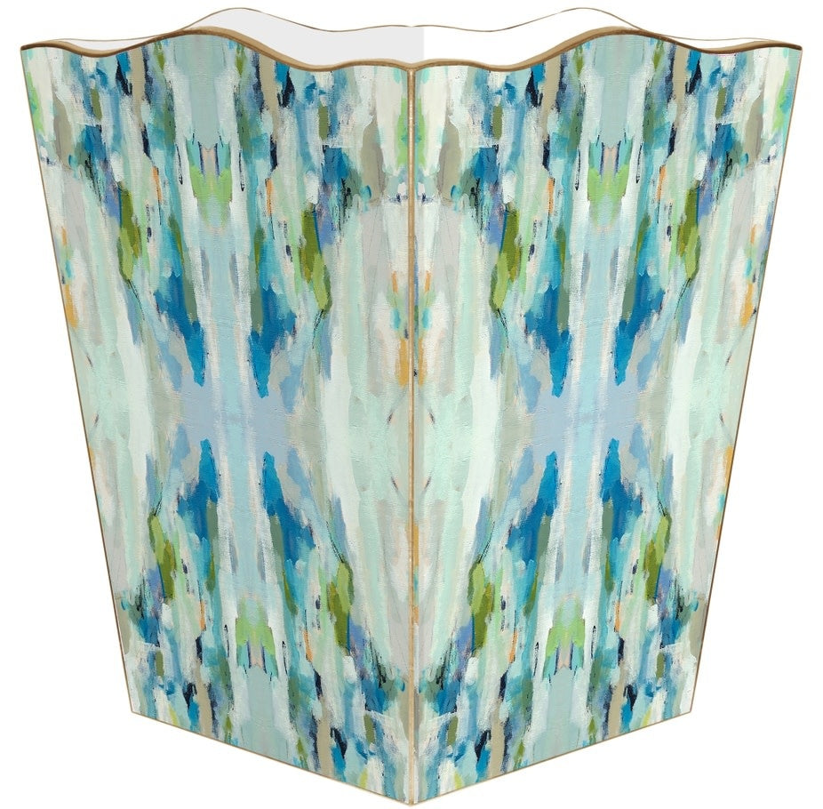 Gold scalloped wastepaper basket with water-resistant exterior.