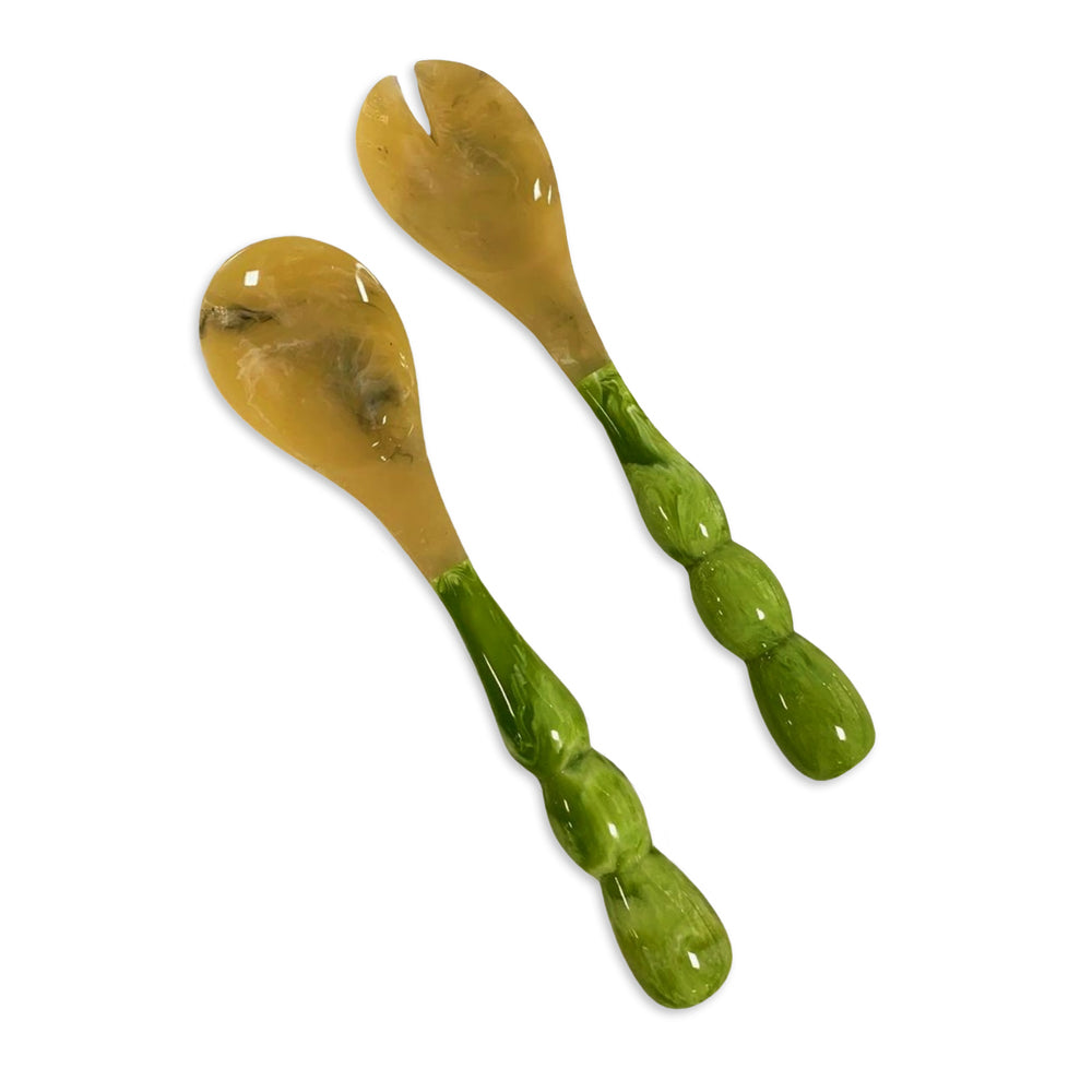 Resin Rio Bubble Salad Servers with translucent yellow heads and green bubble-shaped handles.